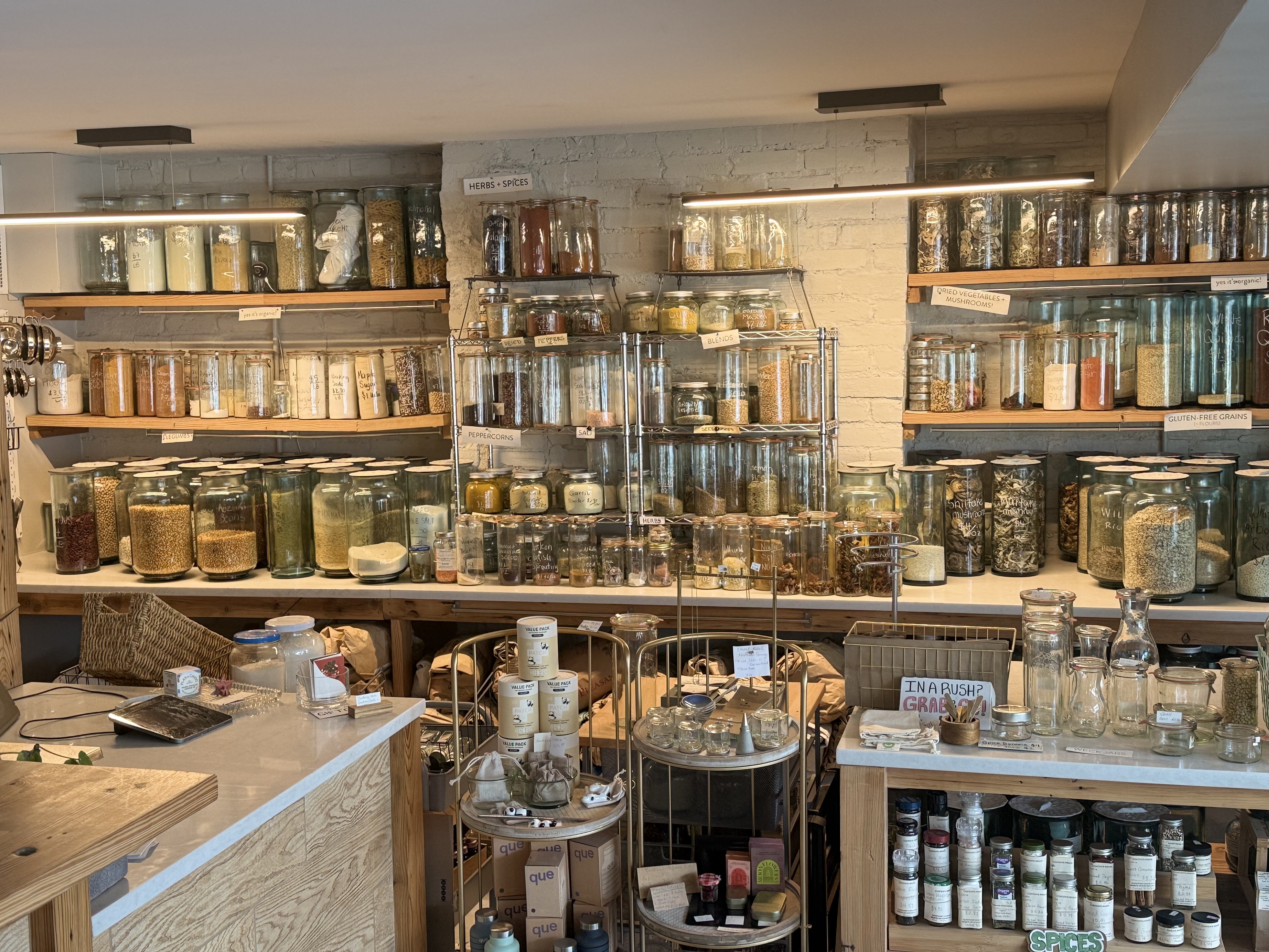 Hundreds of refillable herbs, spices, grains, and pantry staples in glass jars