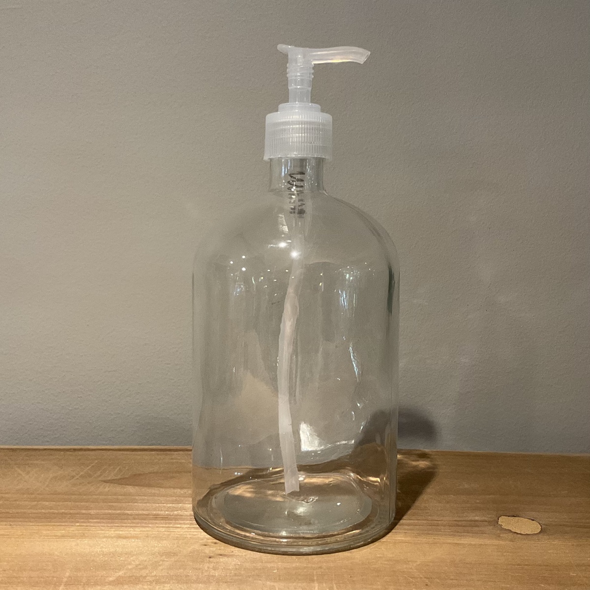 exist green 25 oz Glass Bottle with Clear Pump