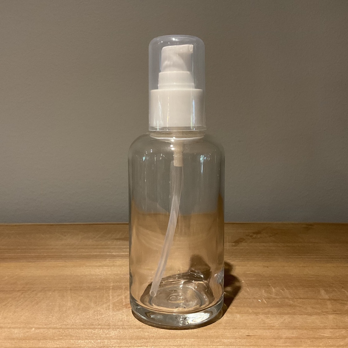 exist green 4oz Glass Bottle w/ White Treatment Pump